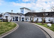 Thumbnail 1 of 4 - Apartment Community Entrance at Spring Arbor of Outer Banks