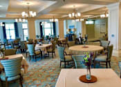 Thumbnail 3 of 5 - A dining room with tables and chairs at Waterstone on Augusta, Greenville, SC