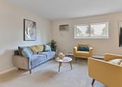 Thumbnail 8 of 28 - a living room with couches and chairs and a coffee table at Aspen Ridge Apartments, Illinois, 60185