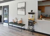 Thumbnail 16 of 28 - an old fashioned popcorn machine in a living room with a couch at Aspen Ridge Apartments, West Chicago, 60185