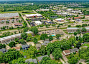 Thumbnail 35 of 35 - Aerial view of apartment community and surrounding area at Fox Run Apartments, St. Charles, Illinois