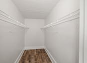Thumbnail 10 of 35 - Walk-in closet with wire shelving at Fox Run Apartments, St. Charles, Illinois