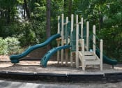 Thumbnail 34 of 35 - a playground with a set of slides in a park