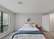 Thumbnail 17 of 35 - the preserve at ballantyne commons bedroom with bed and window