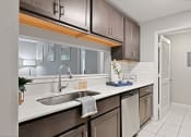 Thumbnail 9 of 35 - a kitchen with a sink and a window and a door