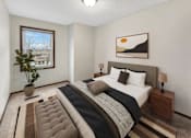 Thumbnail 11 of 40 - a bedroom with a bed and a window