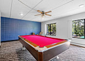 Thumbnail 19 of 23 - a pool table in a house with a ceiling fan