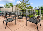 Thumbnail 24 of 40 - the patio of our apartments has tables and chairs