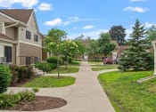 Thumbnail 27 of 43 - a view of a neighborhood with houses and trees