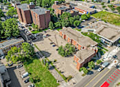 Thumbnail 13 of 25 - an aerial view of a city with buildings and trees