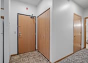Thumbnail 24 of 27 - Apartment entry door and 2 closets