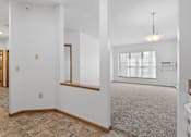 Thumbnail 4 of 27 - an empty room with a reflection of lights on the floor