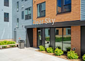 Thumbnail 1 of 36 - The front of a building with the name "Clear Sky" on it.