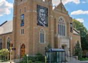 Thumbnail 34 of 45 - an old church with a mural on the side of it