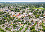 Thumbnail 34 of 35 - an aerial view of a city with buildings and trees