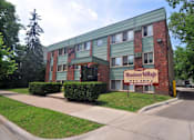 Thumbnail 9 of 9 - A building with a sign that says Morrison Village.