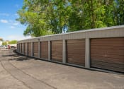 Thumbnail 29 of 57 - a row of garage doors on the side of a building