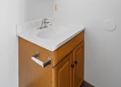 Thumbnail 9 of 43 - a bathroom with a sink and a mirror