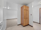 Thumbnail 3 of 43 - an empty room with a closet in the middle of it