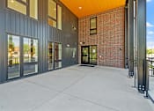 Thumbnail 1 of 53 - the preserve at ballantyne commons exterior walkway with glass doors