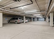 Thumbnail 33 of 35 - the parking garage at the top of the building has two parked cars