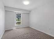 Thumbnail 20 of 53 - a room with white walls and a window