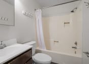 Thumbnail 15 of 57 - a bathroom with a sink toilet and shower
