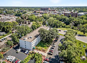 Thumbnail 21 of 23 - an aerial view of a building from a drone