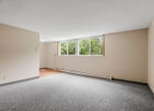 Thumbnail 10 of 57 - an empty room with carpet and a large window