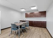 Thumbnail 48 of 55 - a conference room with a table and chairs