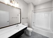 Thumbnail 18 of 24 - a bathroom with a sink toilet and a shower
