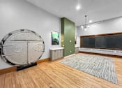 Thumbnail 23 of 24 - an empty room with a large drum in the middle of it