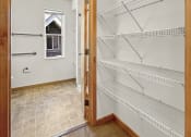 Thumbnail 5 of 52 - an empty room with an open door to an empty closet