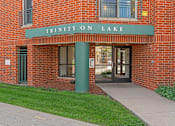Thumbnail 1 of 25 - the entrance to the trinity on lake building