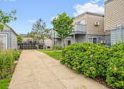 Thumbnail 29 of 40 - the preserve at ballantyne commons walkway between apartment buildings