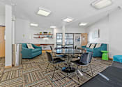 Thumbnail 20 of 27 - Party room with a round table and chairs