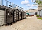 Thumbnail 21 of 40 - the mailboxes are lined up on the side of the building