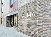 Thumbnail 1 of 17 - The Alma building is located at 105 East Walnut.