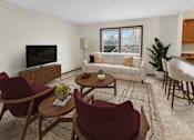 Thumbnail 10 of 40 - a living room with a couch and a table and chairs