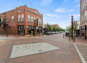 Thumbnail 40 of 47 - A city square with a sign that says "Great American State".