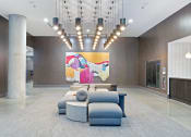 Thumbnail 30 of 35 - a rendering of a lobby with a large colorful painting on the wall