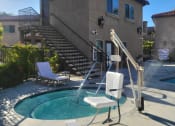 Thumbnail 26 of 29 - jacuzzi w pool in background