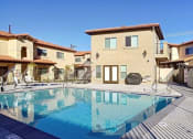 Thumbnail 5 of 29 - a swimming pool in the backyard of a house
