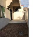 Thumbnail 12 of 29 - a walkway leading up to a house with a fence