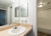Thumbnail 56 of 61 - a bathroom with a sink and a mirror at Red Bay Apartment Complex, Florida, 32211