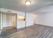 Thumbnail 36 of 61 - a living room with hardwood floors and white walls at Red Bay Apartment Complex, Jacksonville, Florida
