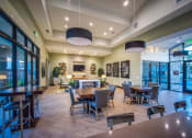 Thumbnail 17 of 22 - a large room with tables and chairs