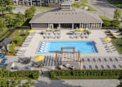 Thumbnail 4 of 12 - A large outdoor swimming pool area with sun loungers and a building in the background.