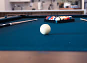 Thumbnail 29 of 34 - A pool table with a white ball in the middle.