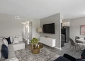 Thumbnail 2 of 30 - a living room with gray walls and a white couch